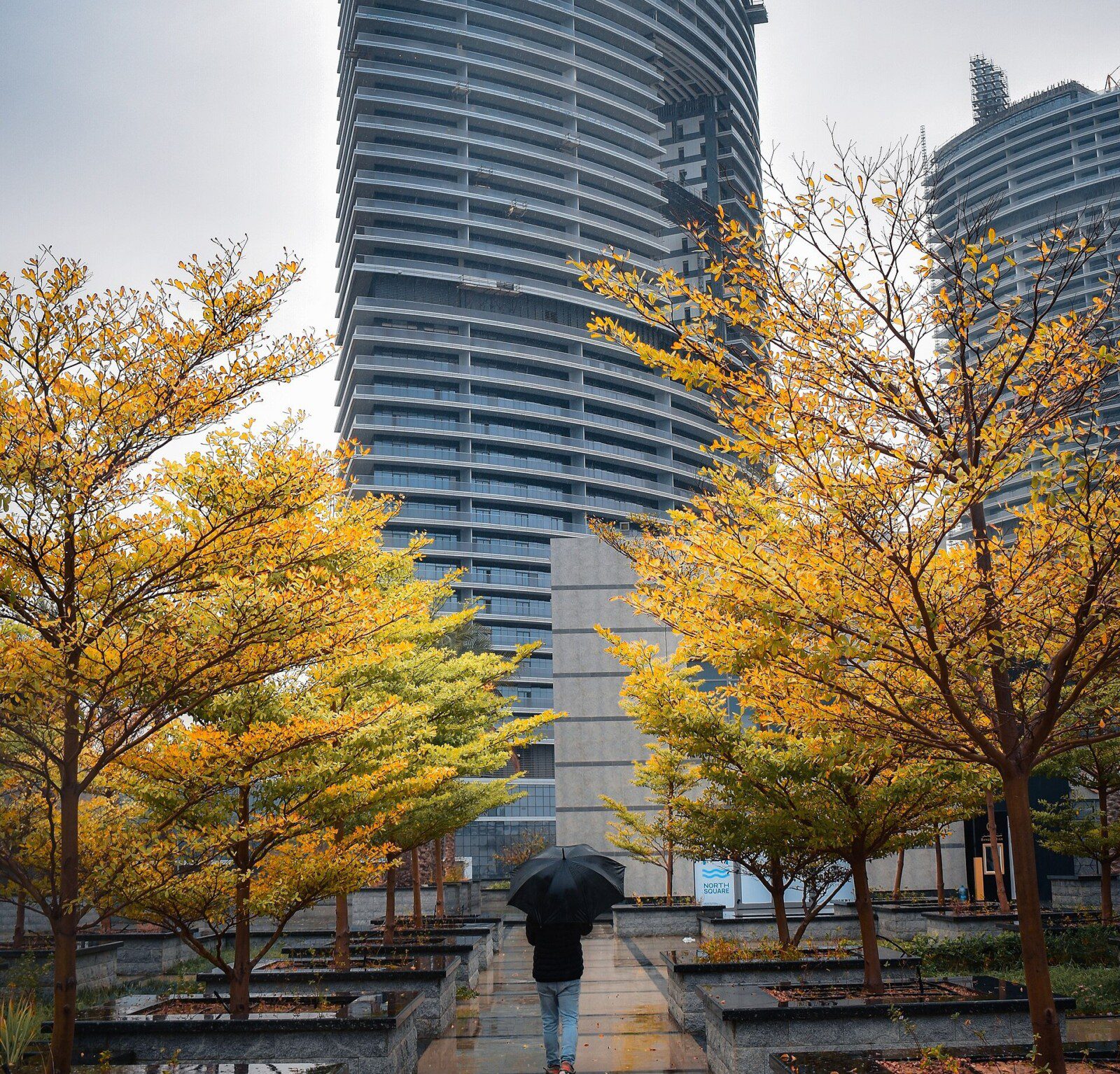 Walking plaza beneath the North Square tower