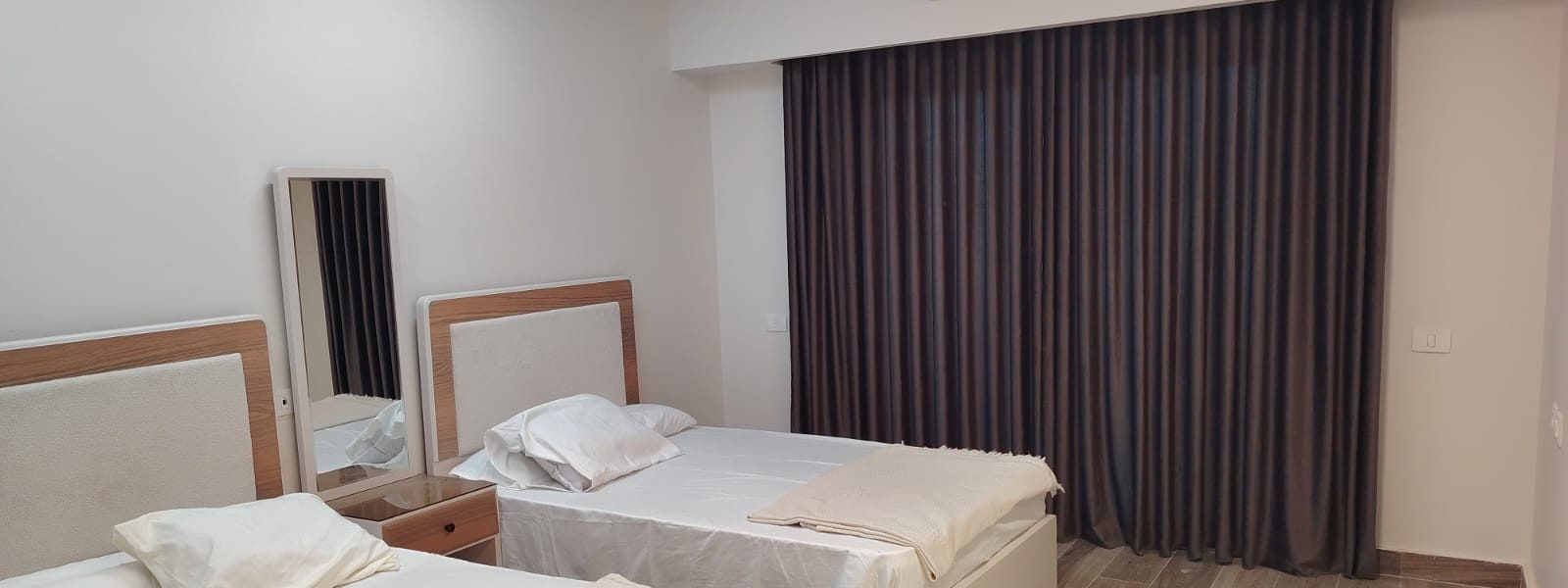 Twin bedroom imagery supplied for New Alamein onboarding